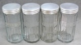 Four spice jars with aluminum lids. Each jar is approx. 5