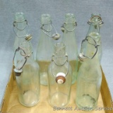 Four Monarch Brewery bottles from Chicago with bale style stoppers; two Nitrate of Magnesia bottles,