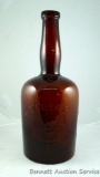 Unique amber bottle is marked 'A. Bauer & Co. Chicago, Ills' and stands 9-1/2