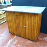 Beadboard cabinet has a galvanized top and is cute as a pin. Measures 3-1/2' wide x 2' x 33