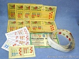Nickel and quarter slot machine cards and more from the 1920s.