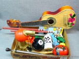 Project ukulele is 2' long; cute little vintage beach shovels; Tonka truck; football kick stand;