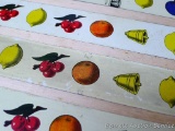 Metal slot machine strips by Mills Novelty Co. Chicago, Copyright 1910 are labeled 'Bell-Fruit-Gum'