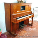 Player piano No. 98363. We could not find a name brand or manufacturer name. Pump pedals move the