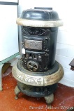 No. 18 Round Oak parlor stove with isinglass windows and nickel plated trim. Stove is approx. 2-1/2'