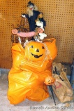 Halloween decorations including a quantity of jack-o-lantern buckets, wall hangings, more.