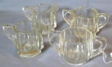 Matched pair of creamer & sugars. One pair is good with no chips or cracks noted; other pair has a