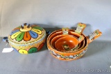 Hand made Mexican casserole dish is in good condition with some minor nicks. Approx. 9