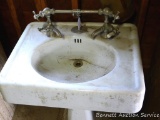 Enameled cast iron pedestal sink is 26