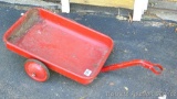 This all metal wagon was pulled by a child's pedal tractor or trike. 3' long with tongue.