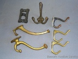 Assorted cast brass and other coat hooks up to 6
