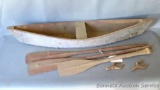 Cute wooden decorative canoe is 2-1/2' long. Comes with oars and oar locks which need to be