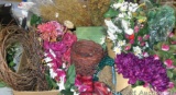 Three large boxes full of floral foam, faux flowers, grapevine wreaths, flower picks, etc.