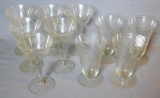Very elegant set of stemware with cut glass floral pattern. Four parfait style glasses, each approx.