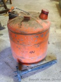 No shipping. Vintage rolled and soldered five gallon gas can with contents. 15