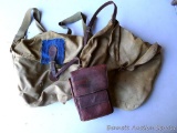 Two old canvas hunting or military packs; plus a leather organizer assembly. Packs are approx. 1',