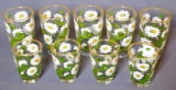 Cheery daisy patterned juice glasses. Four small glasses are approx. 3-1/2