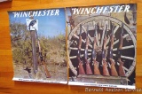 Two vintage Winchester promotional rim fire rifle posters are in good condition with minor spotting,