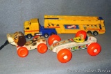 Vintage and newer toys including Fisher Price Bouncy Racer and Little Snoopy wooden pull toys. Also