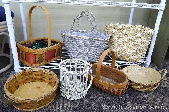 Group of 7 baskets, some are perfect for gift baskets; the largest measures 12"d x 10" tall.