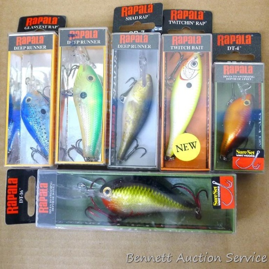Six NIB Rapala fishing lures incl. Twitchin' Rap, Glass Fat Rap, Shad Rap and more. Sizes range from