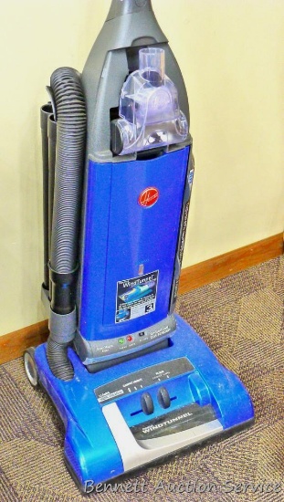 Hoover WindTunnel vacuum cleaner with extra bags. Vacuum works.