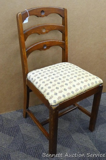 Adorable wooden chair with cute upholstery seat. 16-1/2" w x 15" d x 33" h.