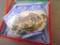 Egg shell porcelain Oriental octagonal bowl depicts mountain scene and comes with storage box. Bowl
