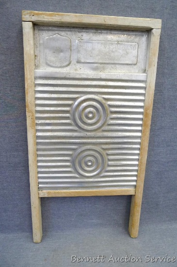 Magic Circle wood and metal washboard is approx 12-1/2"x 24". In good condition.