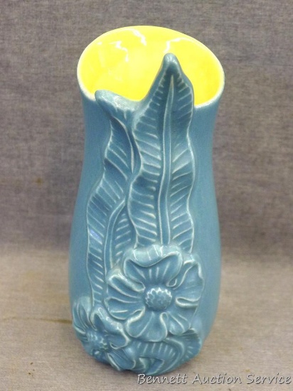 Red Wing art pottery vase stands nearly 8" tall and is a pretty blue with a yellow interior. Bottom