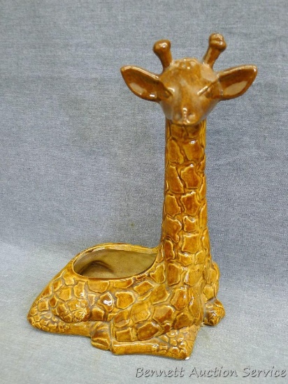 Red Wing giraffe planter stands 11-1/2" tall and is marked on bottom 'Red Wing USA 896'. Glaze flaw