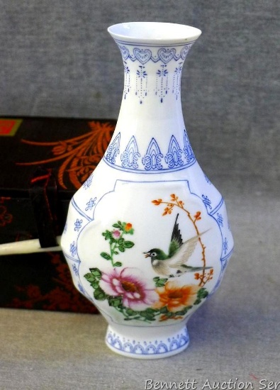 Very fragile hand painted bud vase with padded storage box. Vase is 5-3/4" tall and in good