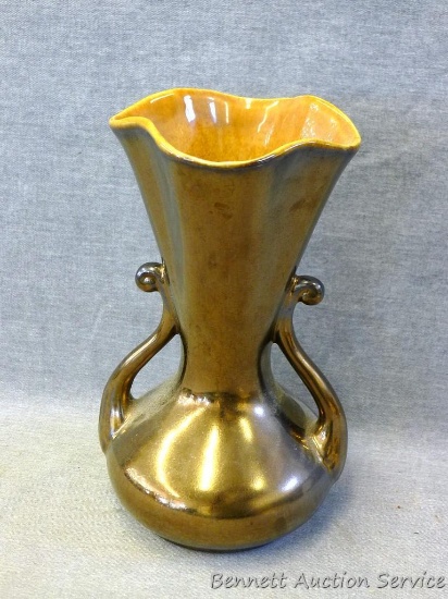 Red Wing art pottery vase has a pretty metallic glaze and stands 8" tall. No chips or cracks noted.
