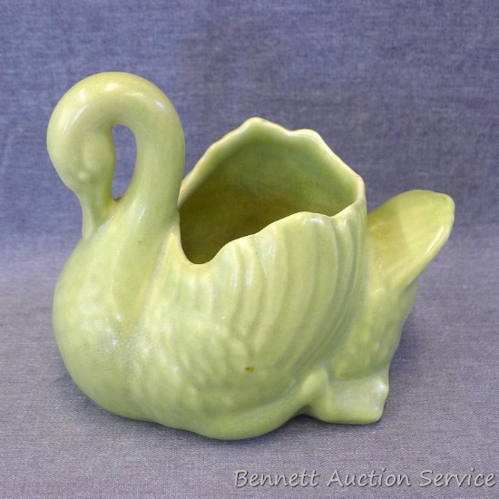 Red Wing art pottery swan planter is marked on bottom 652 and stands 5-1/4" tall. Piece is in good