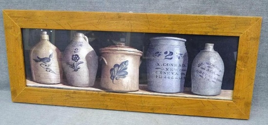 Nicely framed print of pottery. Measures approx. 10" x 26" over rustic frame.