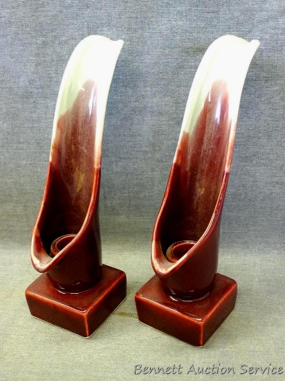Matched pair of Red Wing Anniversary Series candle sticks stand 8-1/4" overall. Each piece is marked