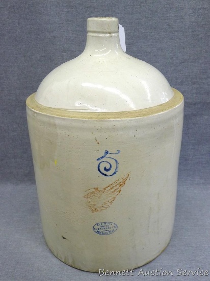 Five gallon Red Wing jug has a large wing and is in good condition with a couple of chips noted on