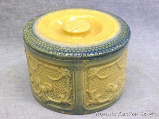 Glazed stoneware butter crock or jar with lid once had a handle according to the little holes on the