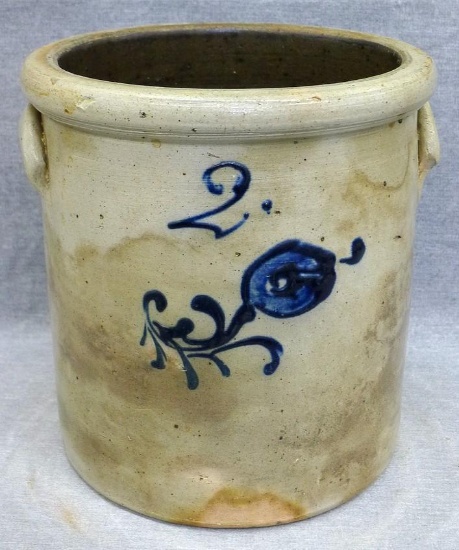 Two gallon salt glazed stoneware crock with cobalt flower design. Piece is unmarked and in overall