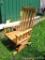 Wooden glider chair shows wear from being outside. Very solid and comfortable 25