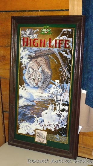 Miller High Life bobcat and hare beer mirror in good condition. Measures approx. 25" x 15" over