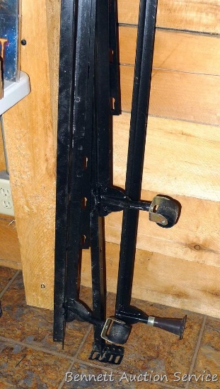 Adjustable multi-size metal bed frame is in fair condition.
