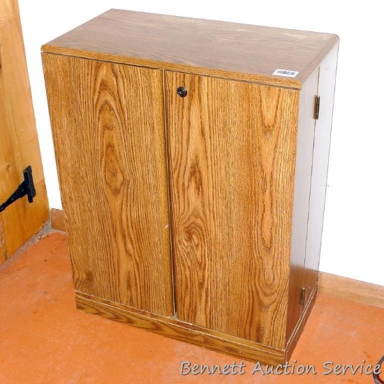 23" x 12" DVD or VHS storage unit. Some scratches visible.