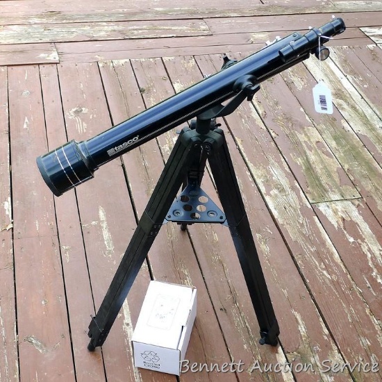 Tasco 60 mm telescope with tri-pod ; 28" long and comes with auxiliary eye pieces, lenses and more.