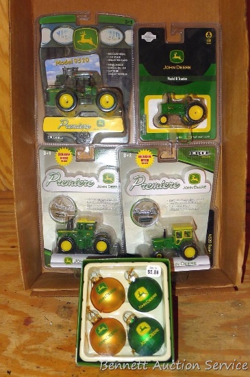 John Deere model 9520 1:64 scale tractor; John Deere model B 1:50 scale tractor; John Deere model
