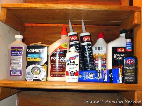 Full and partial containers of clear latex caulk, Kingsford charcoal lighter, 5W-30 motor oil,