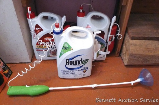 One full and one partial gallon of Ortho Insect Killer, partial gallon of Roundup weed killer.