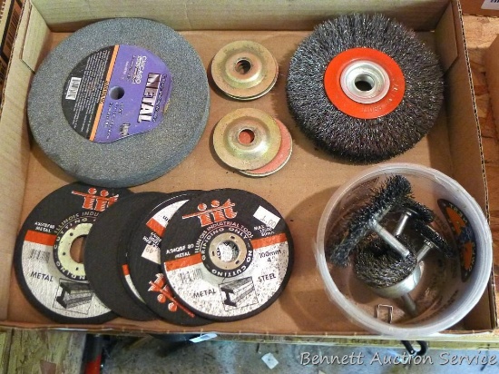 Assortment of 4" grinding wheels, cutoff wheels; assortment of wire brushes for a drill; bench
