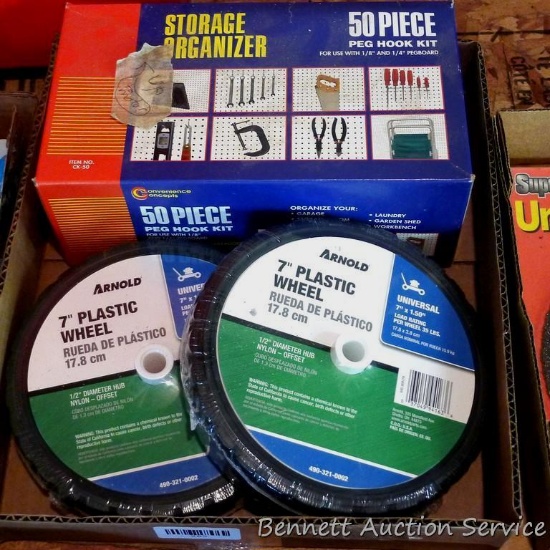 Arnold 7" plastic wheels NIP; assortment of peg board hooks.