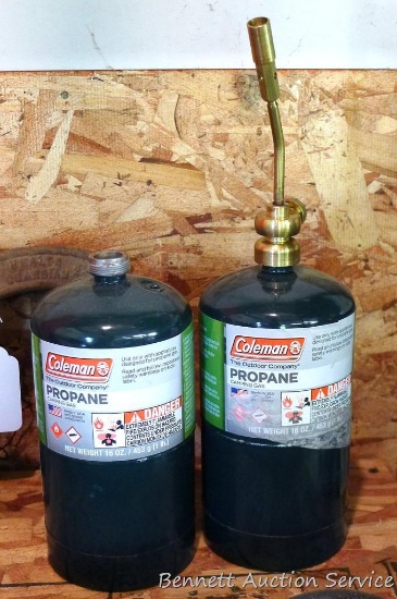 Propane blow torch including two cans of Coleman one pound cylinders. If shipped, will not ship